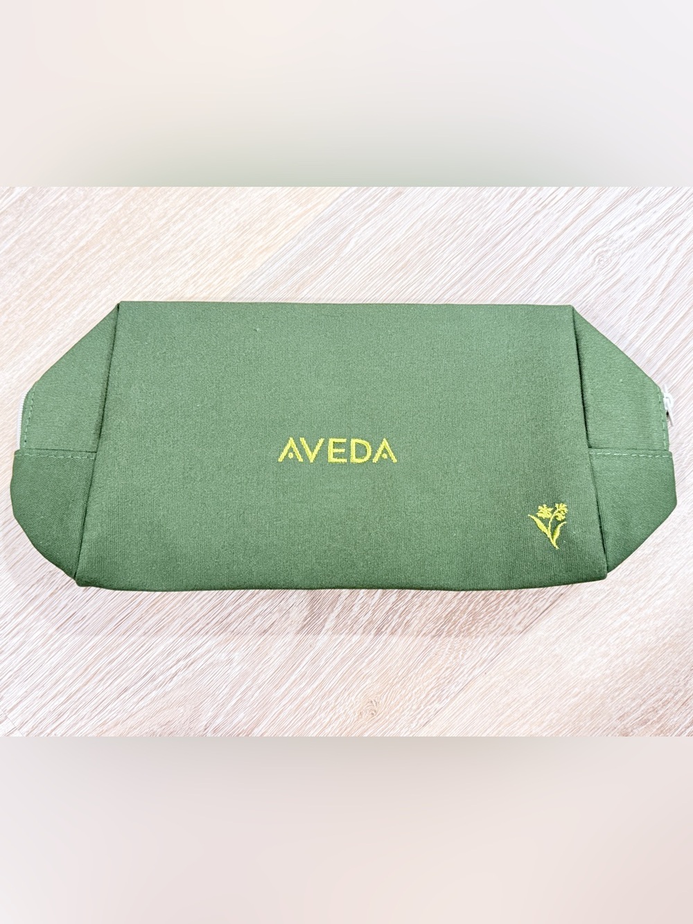 AVEDA Green Exterior with Tan Branded Interior Pouch